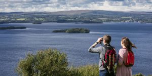 Couple enjoying a spectacular view overlooking Lough Derg