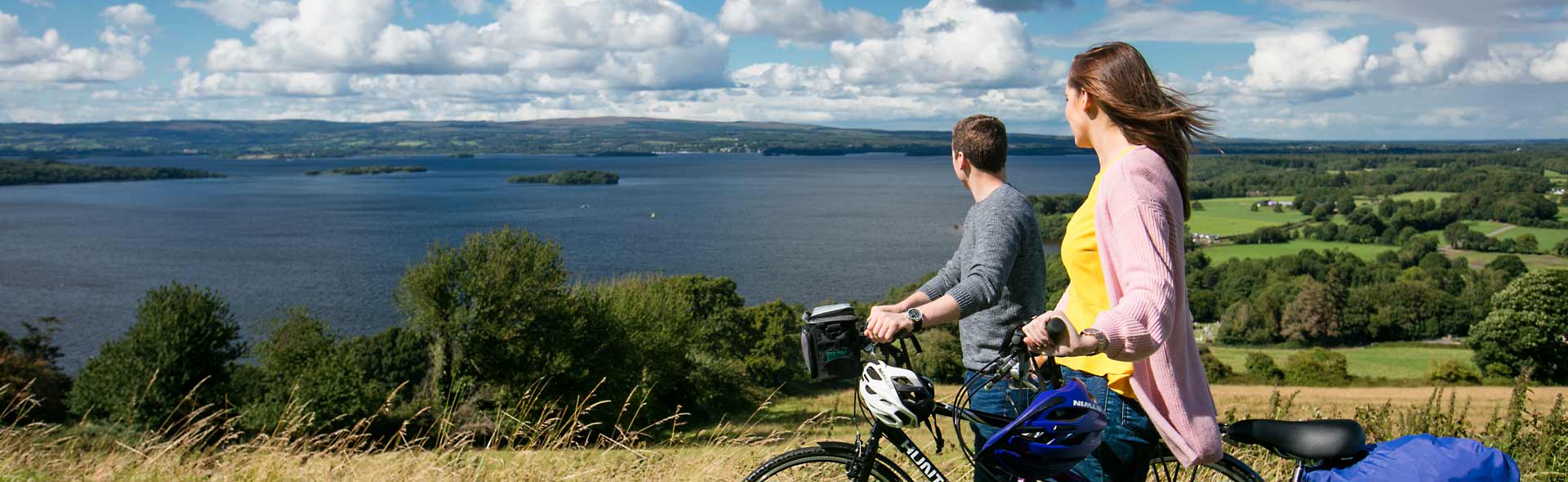 cyclists look out over Lough Derg